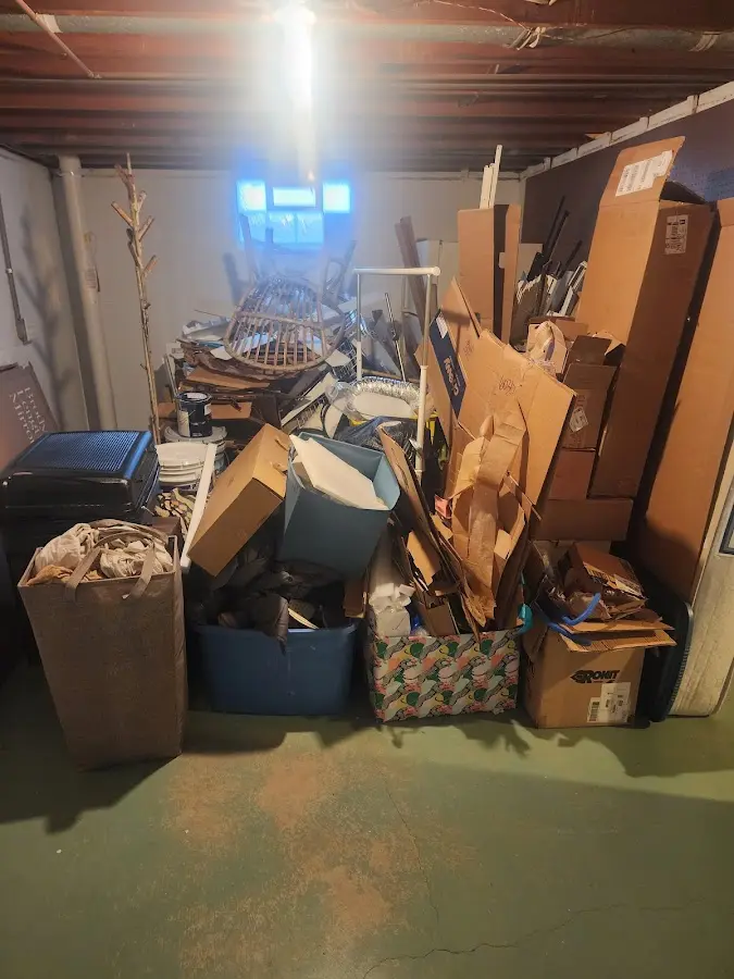 Roll-off dumpster container at job site for Yard Waste Dumpster Rental in Coeur d'Alene